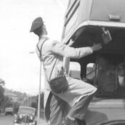 Graham Mitchell changing the destination blind on a bus at Utley terminus in 1962