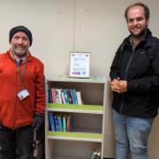 Councillors Mark Curtis, left, and Luke Maunsell with the new mini-library
