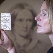 Sarah Laycock with one of the treasured items in the Bronte Parsonage Museum collection