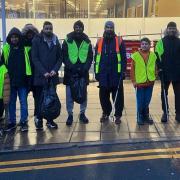 Members of Keighley's Ahmadiyya community take part in the clean-up