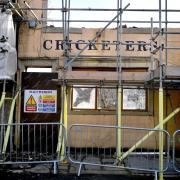 The former Cricketers Arms pub undergoes demolition