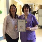 Danielle Longworth, left, patient service manager for theatres, anaesthetics and ICU at Airedale Hospital, and Karen Burnett, hospital data manager at Airedale for the National Joint Registry, with the award