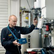 A Northern Gas Networks engineer carries out checks on a boiler