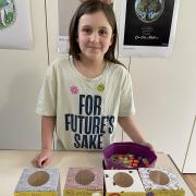 A young stallholder at the summit