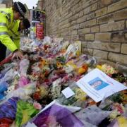 Flowers at the scene of the incident (photo: PA)