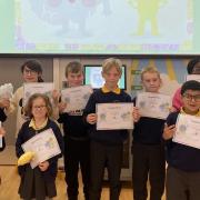 Some pupils with their myHappymind certificates