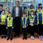 MP Robbie Moore with pupils during his visit to Long Lee Primary School