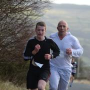 Winner Lucas Lee, right, and Harry Muir battle it out in the Silsden New Year Fun Run