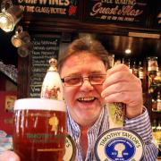 Boltmaker’s Arms licensee, Phil Booth, serves up a pint of Boltmaker, the Timothy Taylor’s brew vying for glory in the Great British Beer Festival