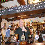 Paul Stapleton, licensee at the Old Silent in Stanbury, pulling a pint of Theakston’s Old Peculier