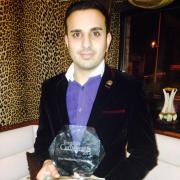 Iftikhar Hussain, with the award for best marketing campaign