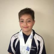 City of Bradford Swimming Club's Freddy Dean won two silver medals and a bronze at Ponds Forge.