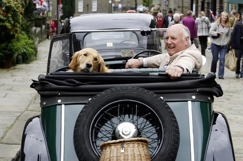 Terry Slocombe of Cottingley and his dog Frazz take to the streets a 1938 Morris 8 Tourer