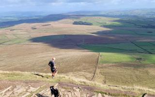Tom Hollins at the top of Pendle Hill