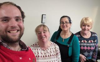 Councillor Luke Maunsell at the Christmas fair with, from left, Susan Peel, Ruth Payne and Eileen Yeomans