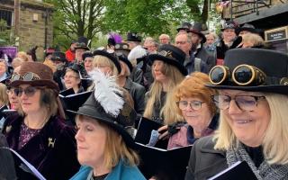 Choir members perform at Haworth Steampunk Weekend